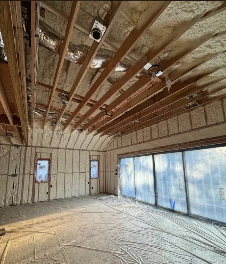 Interior walls and ceiling insulated with spray foam during new construction in Floresville