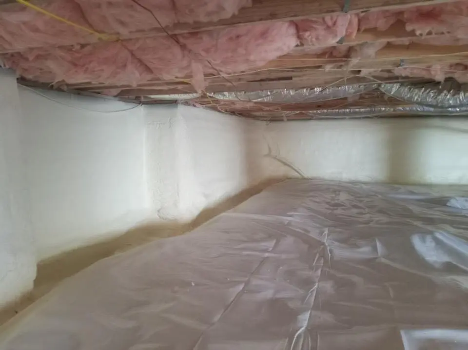 Crawl space encapsulation with closed-cell spray foam for Commercial Roof Restoration in Floresville